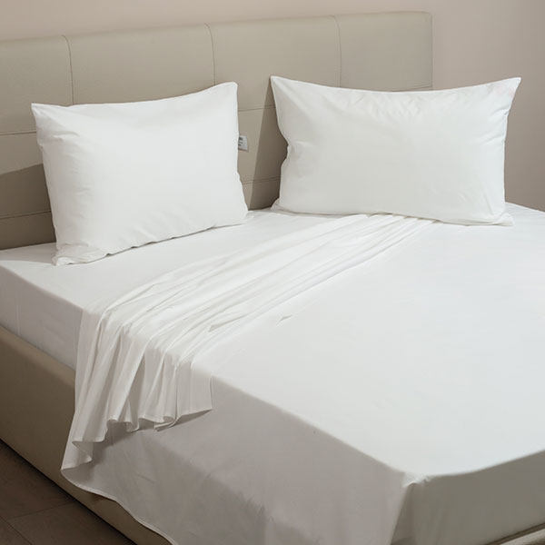 Completo-Lenzuola-100-Cotone-Continuativo-Color-Bianco-Letto.jpg