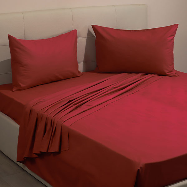 Completo-Lenzuola-100-Cotone-Continuativo-Color-Bordeaux-Letto.jpg